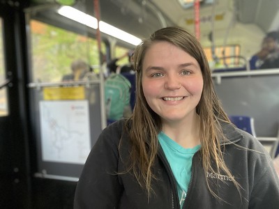 Student riding a Metro Transit bus