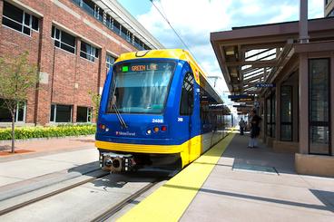 A Light Rail Train pulled up at East Bank Station